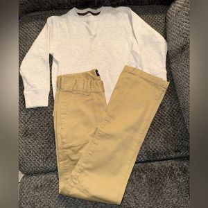 Boy's sweater and long pants.